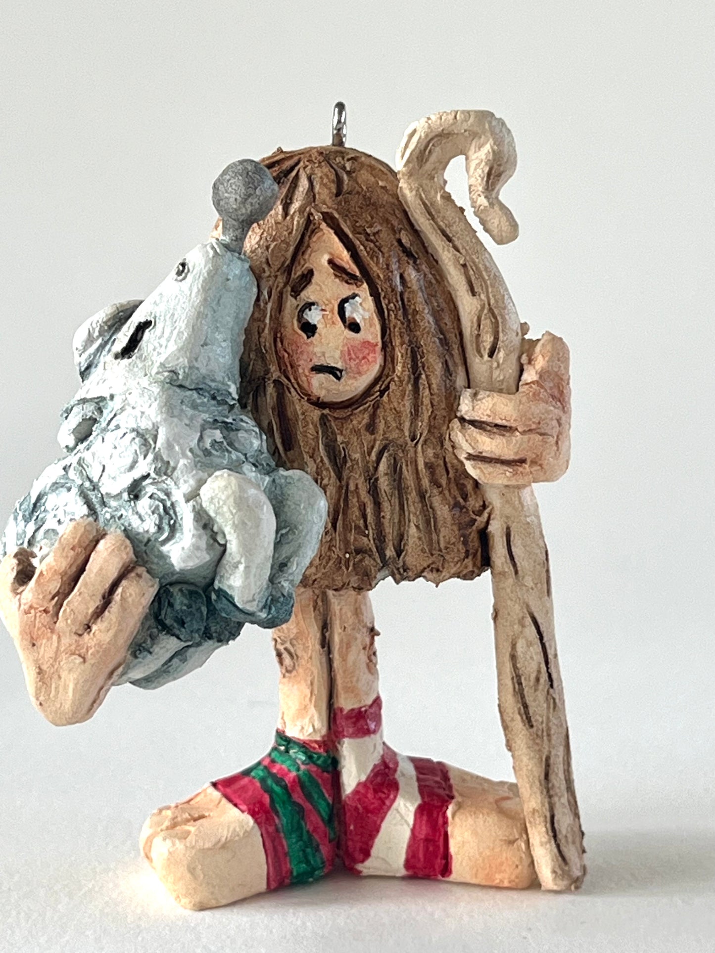 Hands Full of Mischief-sheep in right hand