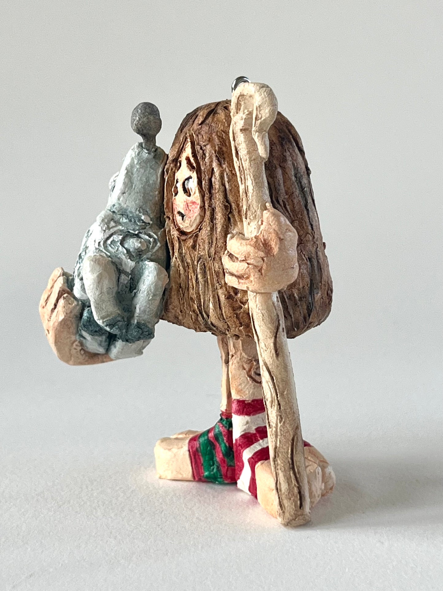 Hands Full of Mischief-sheep in right hand