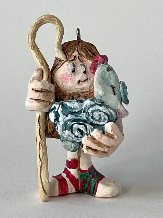 Hands Full of Mischief-sheep licking face