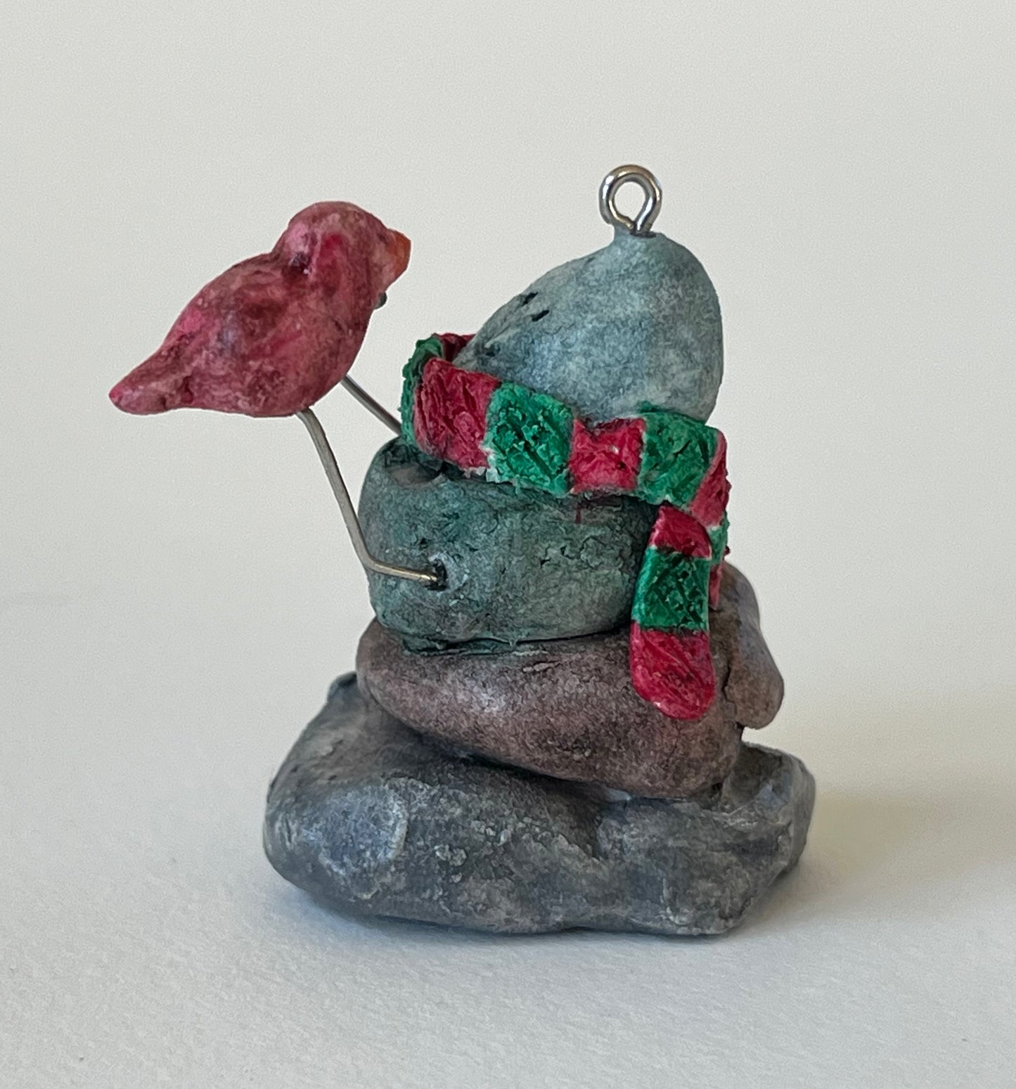 Curious Cairn-red bird